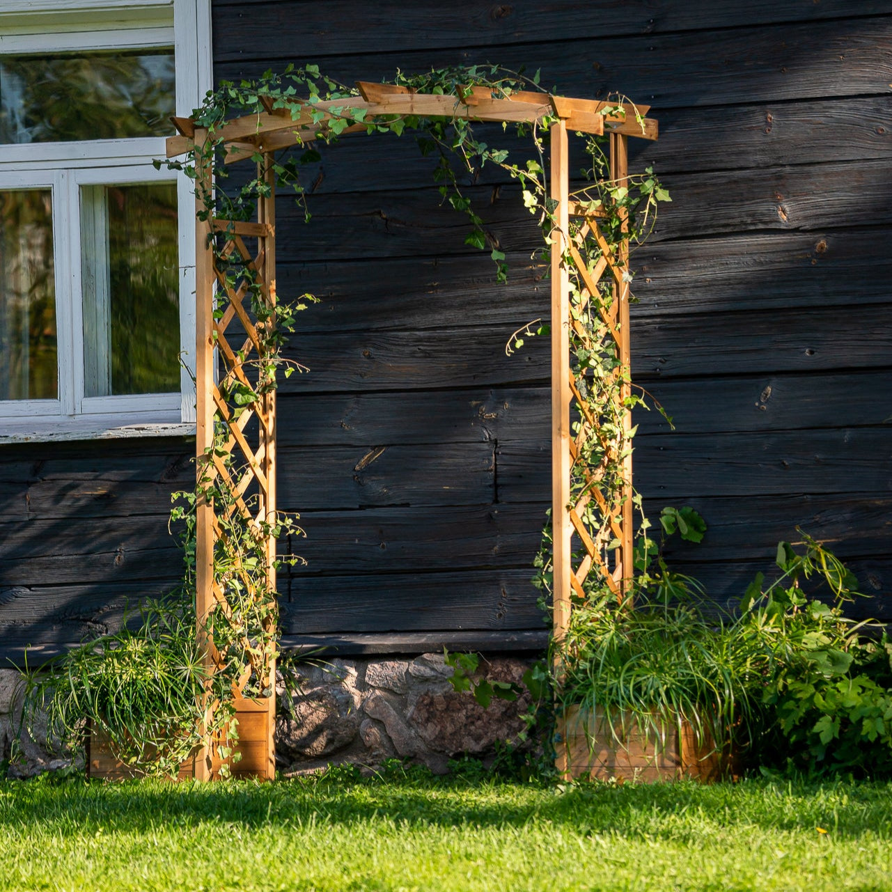 Round arch with flower boxes